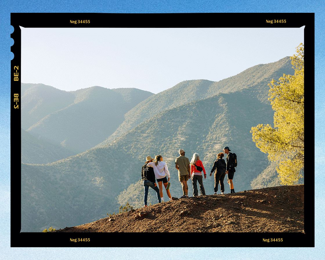 Group of travellers overlooking a canyon