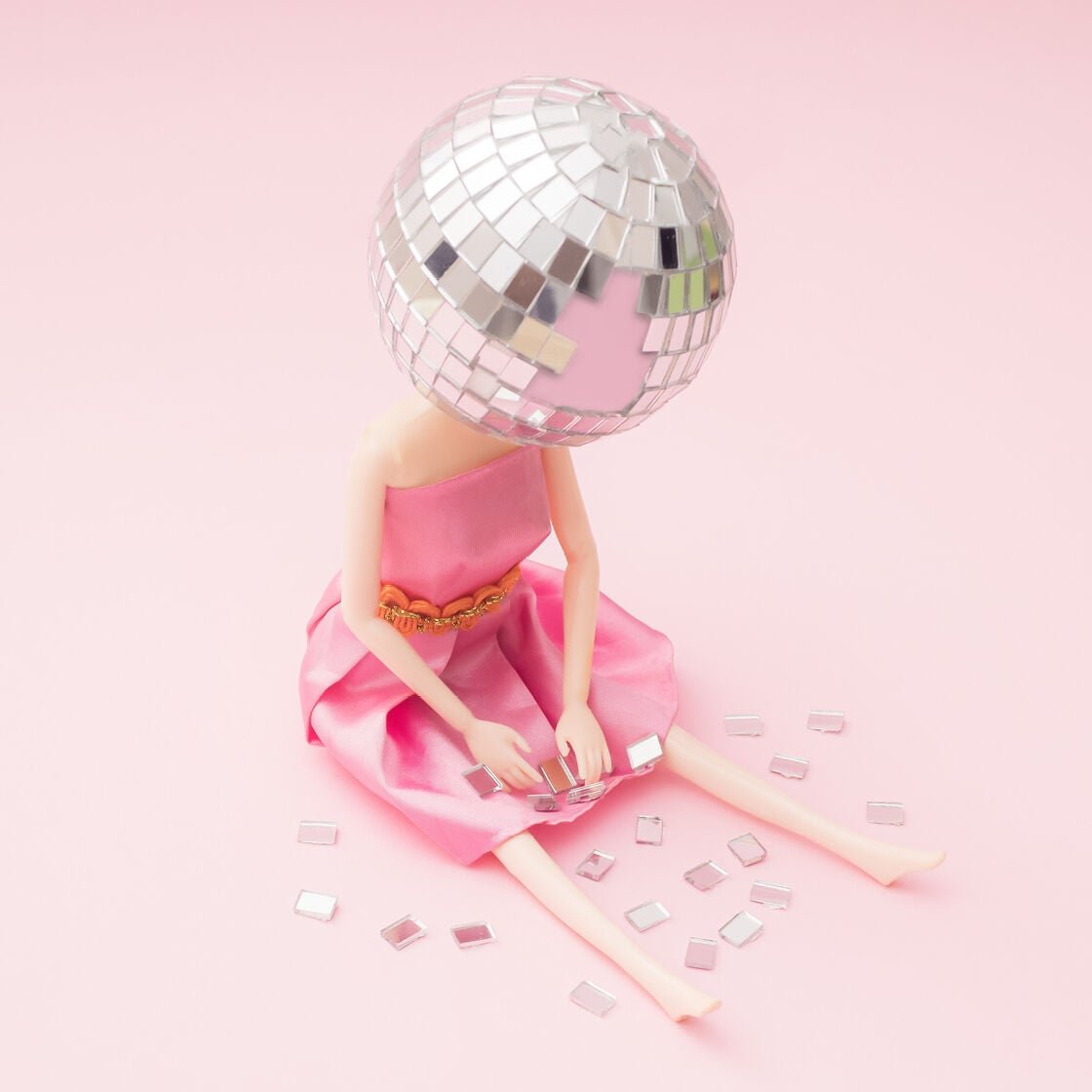 barbie doll with mirror disco ball on head - end of year spiral, new year's eve