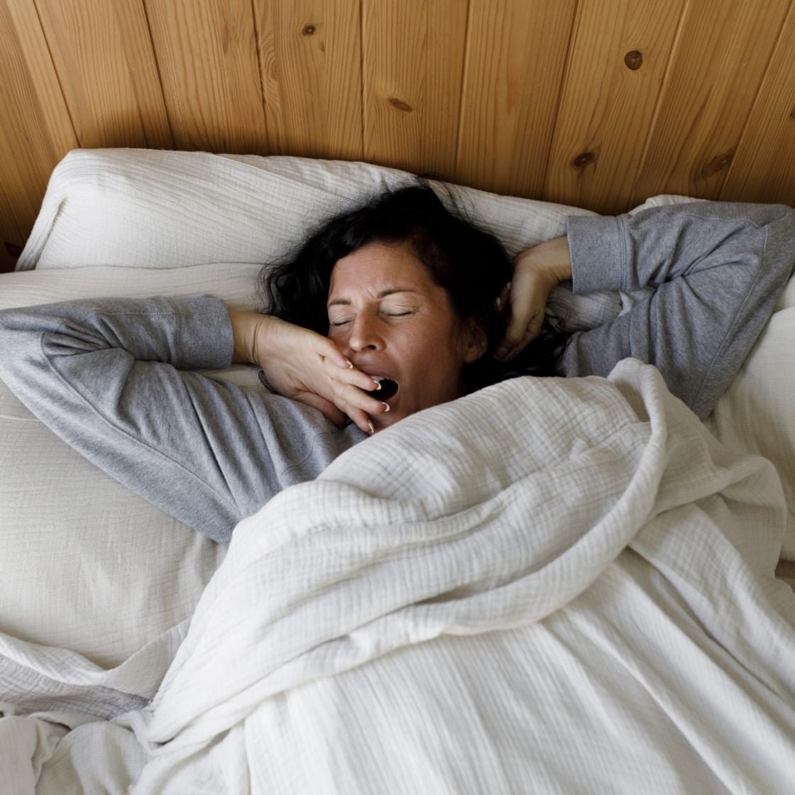 A woman yawning