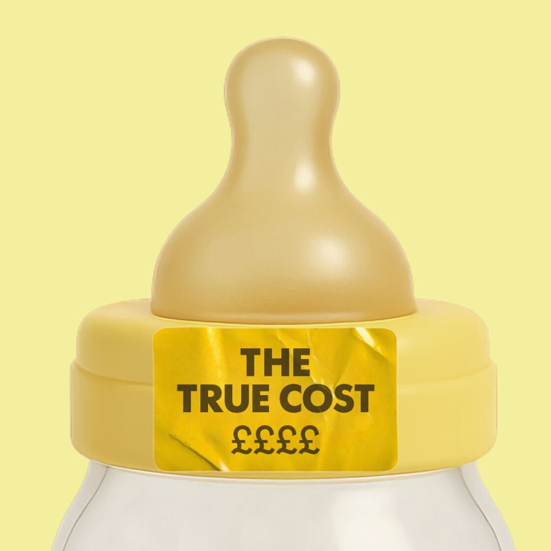 A baby bottle with The True Cost written on a sticker on the teet