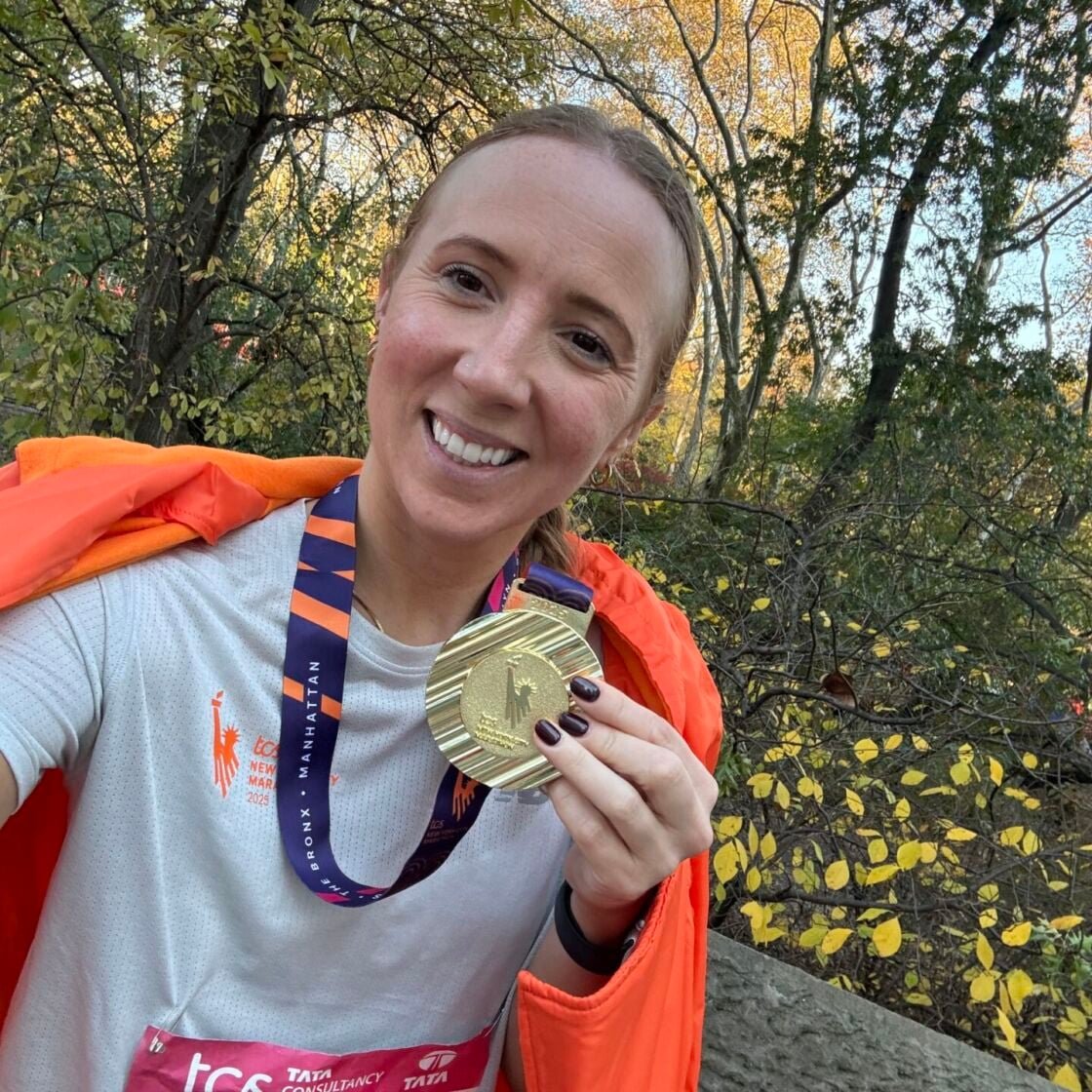 Sarah Jones with her NYC marathon medal after the race