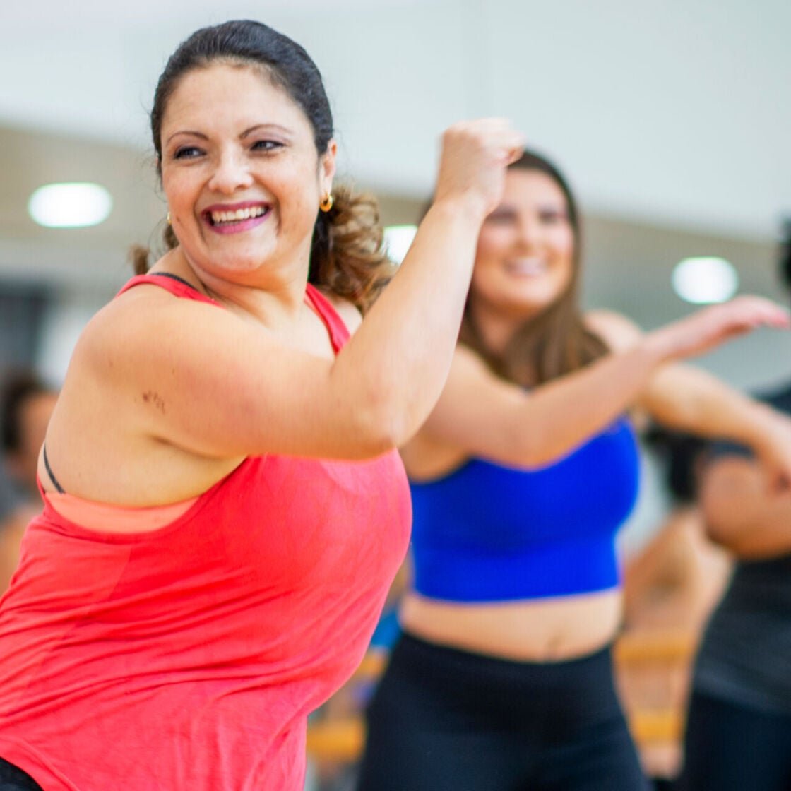A woman dancing at her local leisure centre
