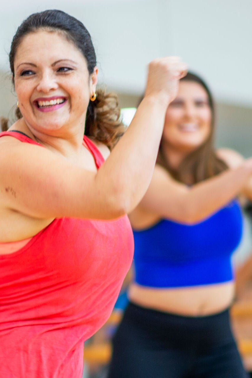 A woman dancing at her local leisure centre