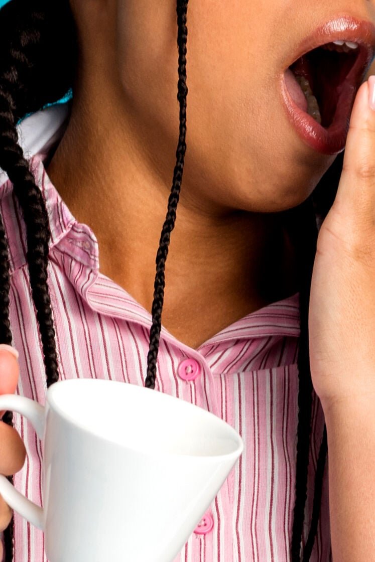 A woman yawning