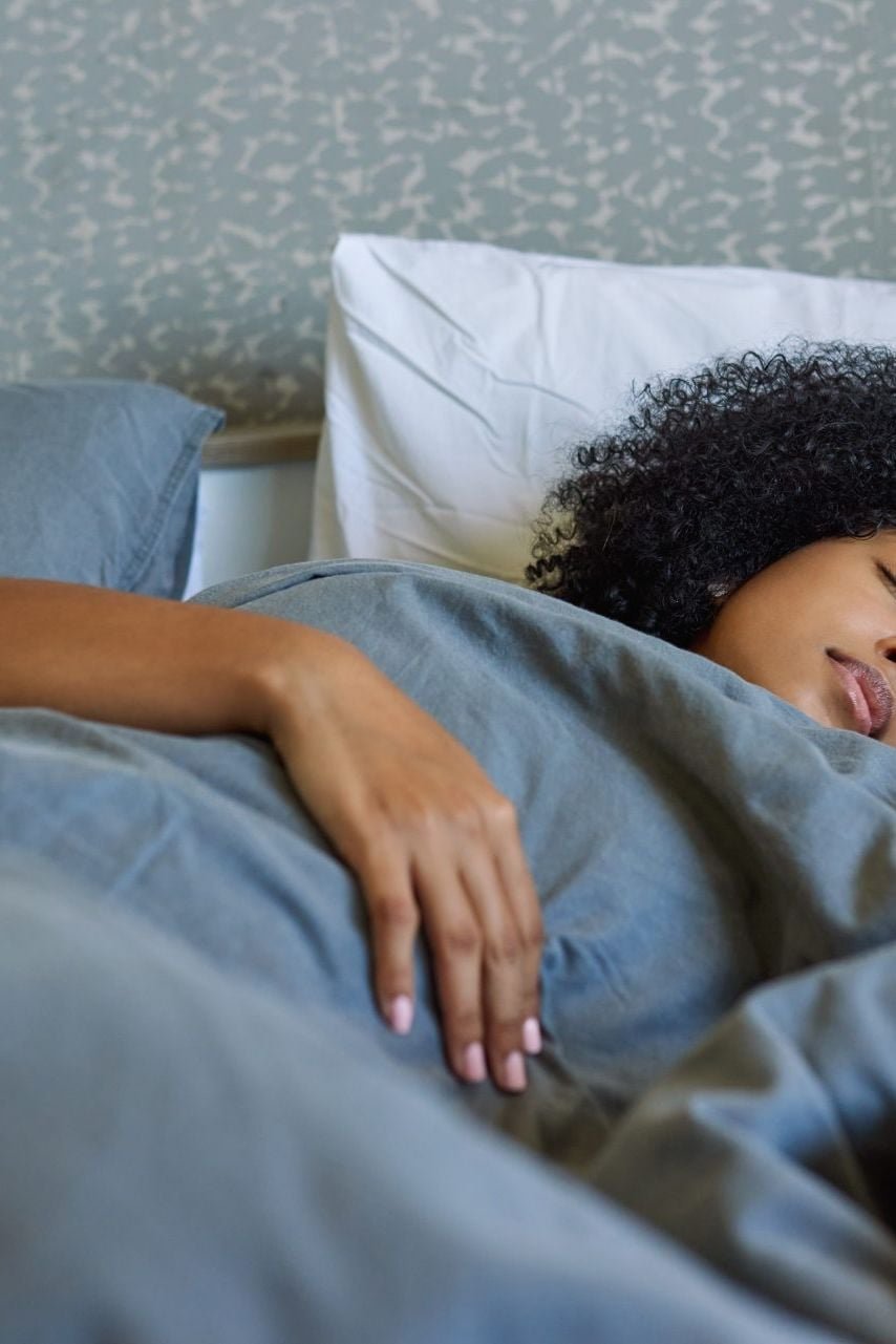 Woman sleeping in bed