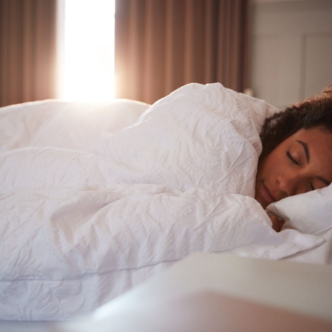 A woman sleeping in autumn