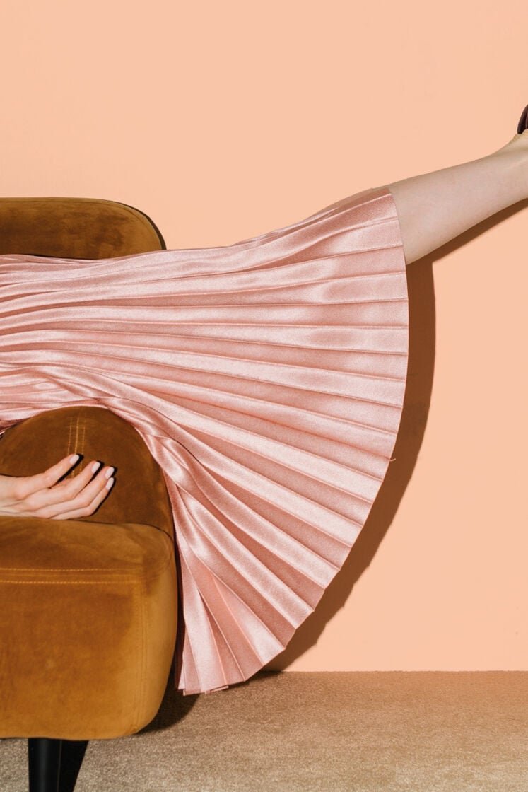 Woman slumped on sofa hosting when knackered