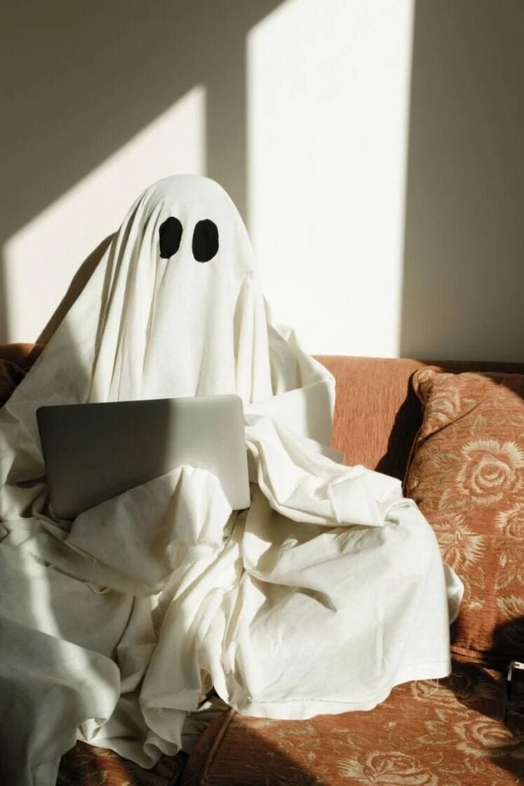 ghost working on a laptop