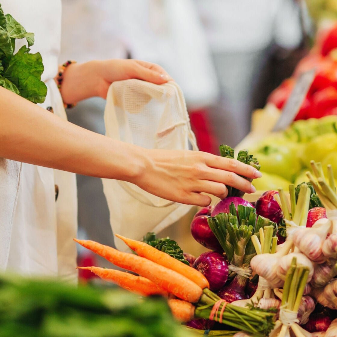 Woman picking out veg