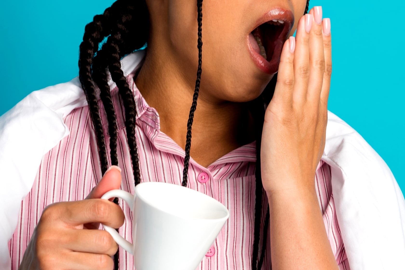 A woman yawning