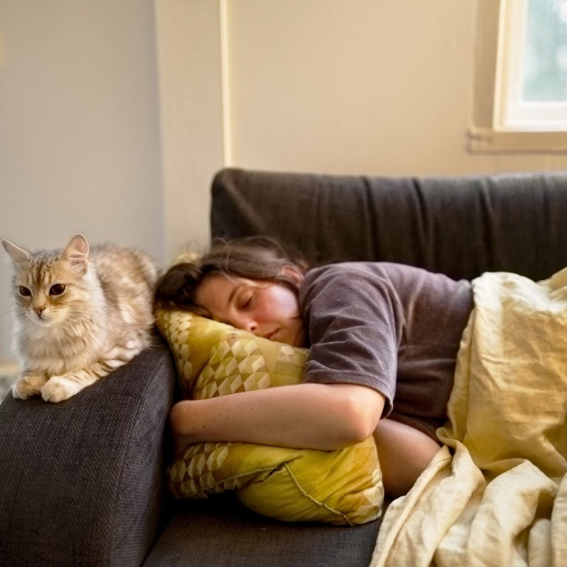 A woman asleep on the sofa