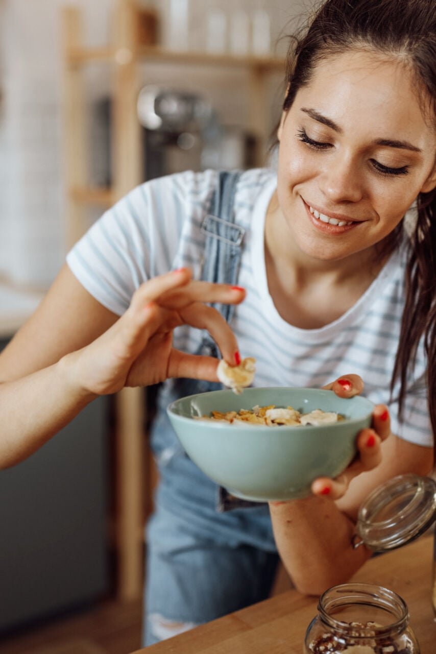 woman eating oats