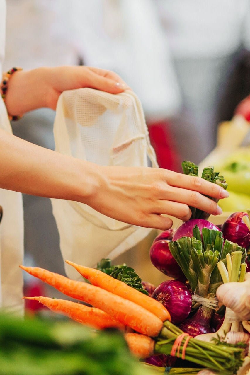 Woman picking out veg