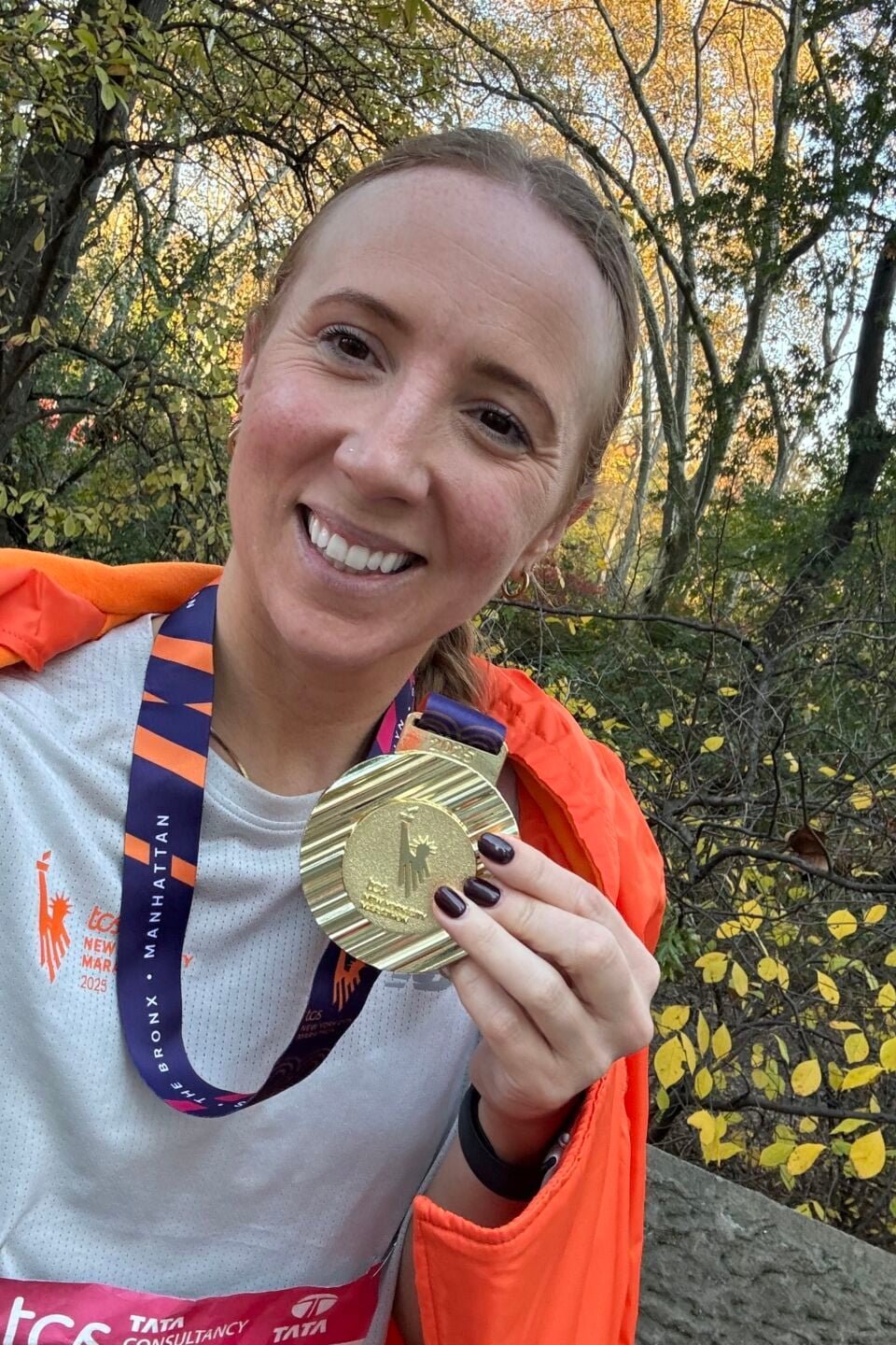 Sarah Jones with her NYC marathon medal after the race