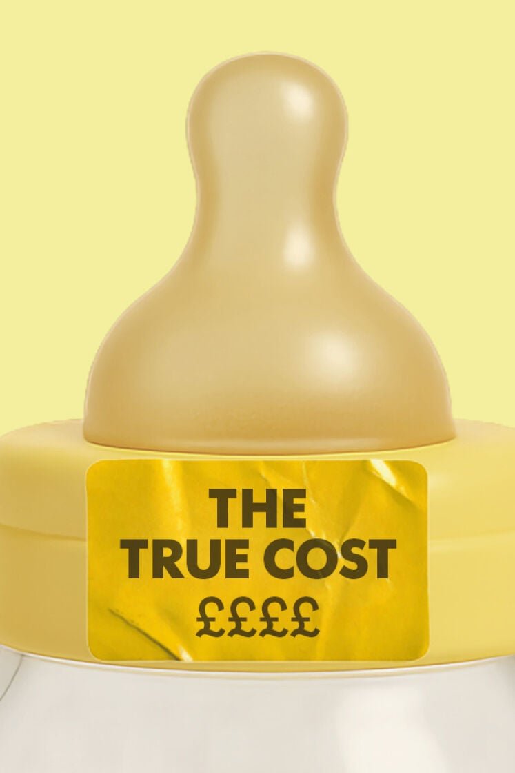 A baby bottle with The True Cost written on a sticker on the teet
