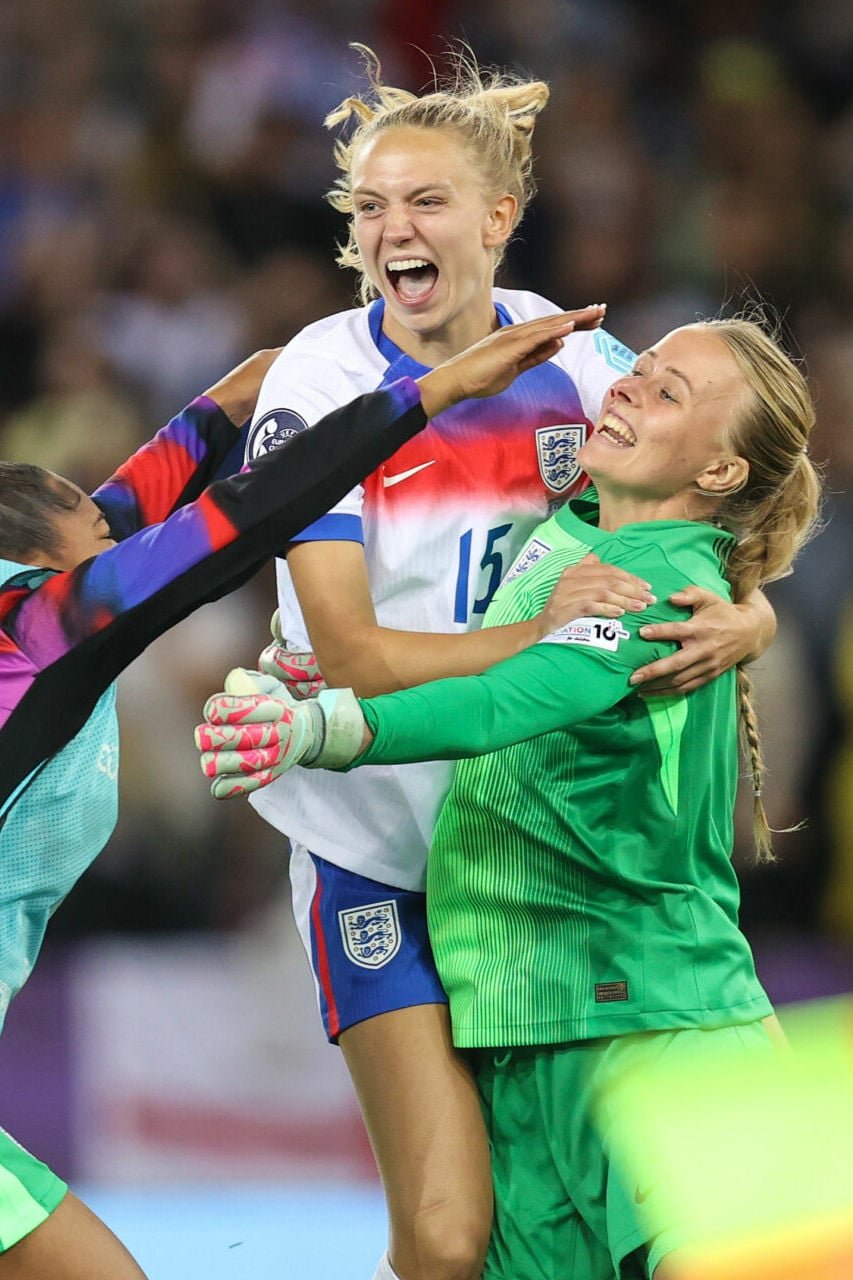 ZURICH, SWITZERLAND - JULY 17: England goalkeeper Khiara Keating and Esme Morgan celebrate with goalkeeper Hannah Hampton after they win the penalty shootout during the UEFA Womens EURO 2025 Quarter-Final match between Sweden and England at Stadion Letzigrund on July 17, 2025 in Zurich, Switzerland. (Photo by Charlotte Wilson/Getty Images)