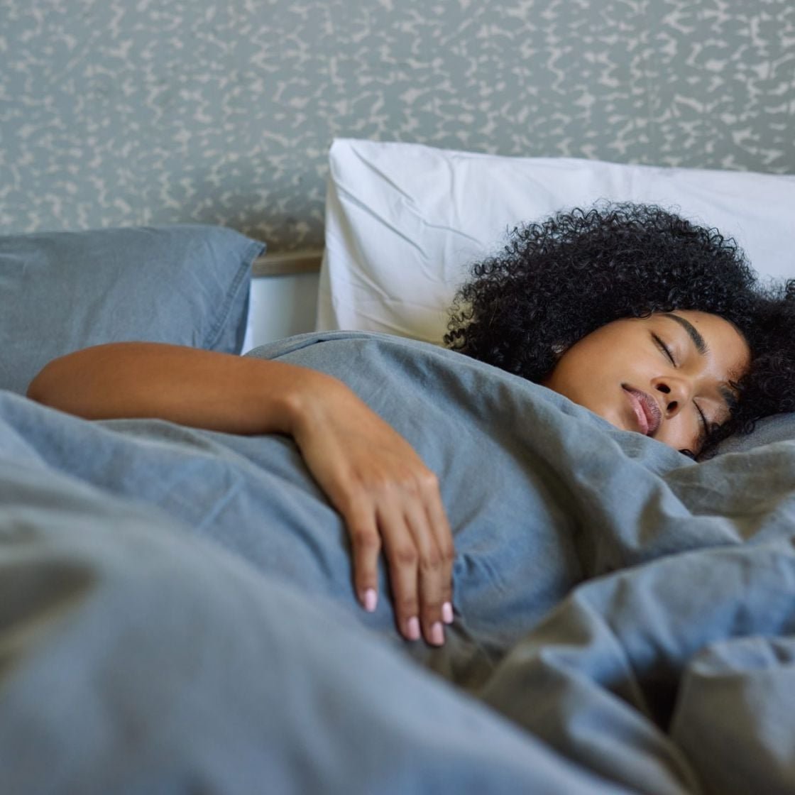 Woman sleeping in bed