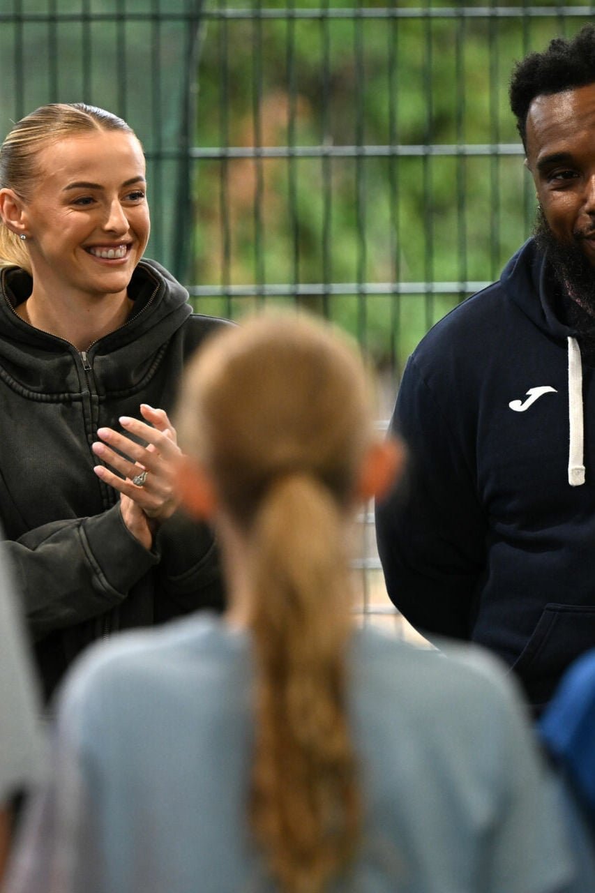 LONDON, ENGLAND - OCTOBER 13: Chloe Kelly chats to pupils with Saving Souls Hub founder Kerry Phillips on a surprise visit to members of Saving Souls Hub and pupils at The Charter School North Dulwich on October 13, 2025 in London, England.
