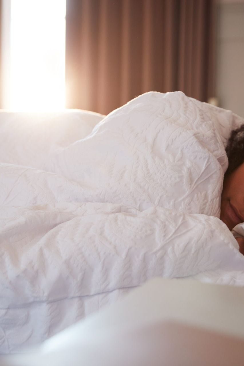 A woman sleeping in autumn