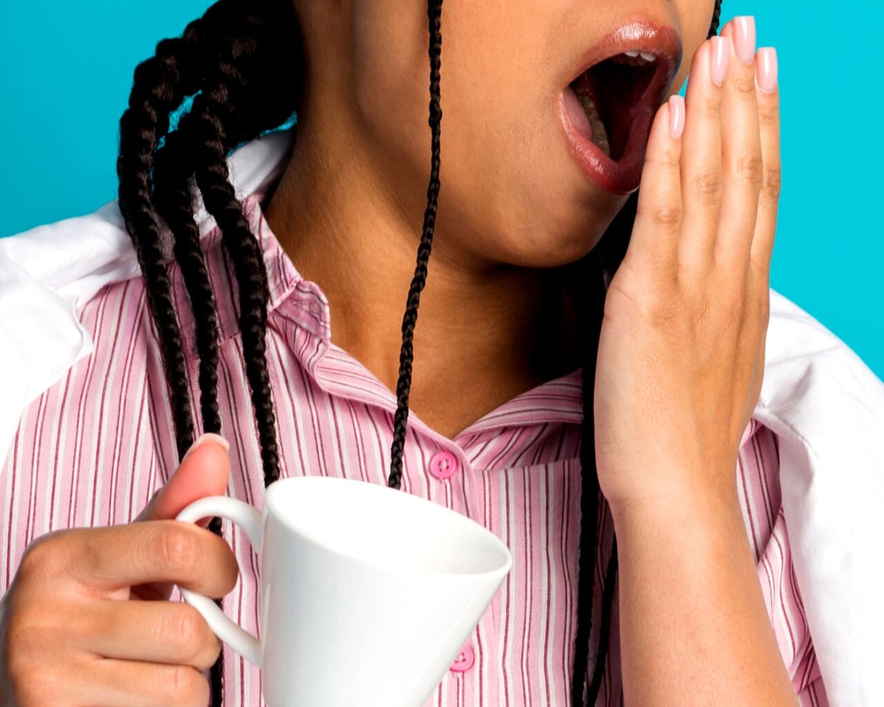 A woman yawning